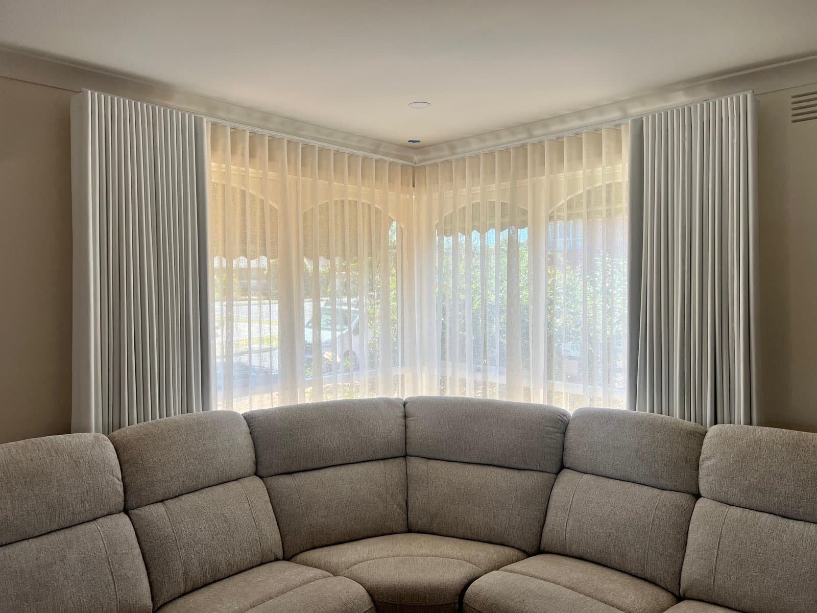 Sheer curtains installed in a Melbourne living room